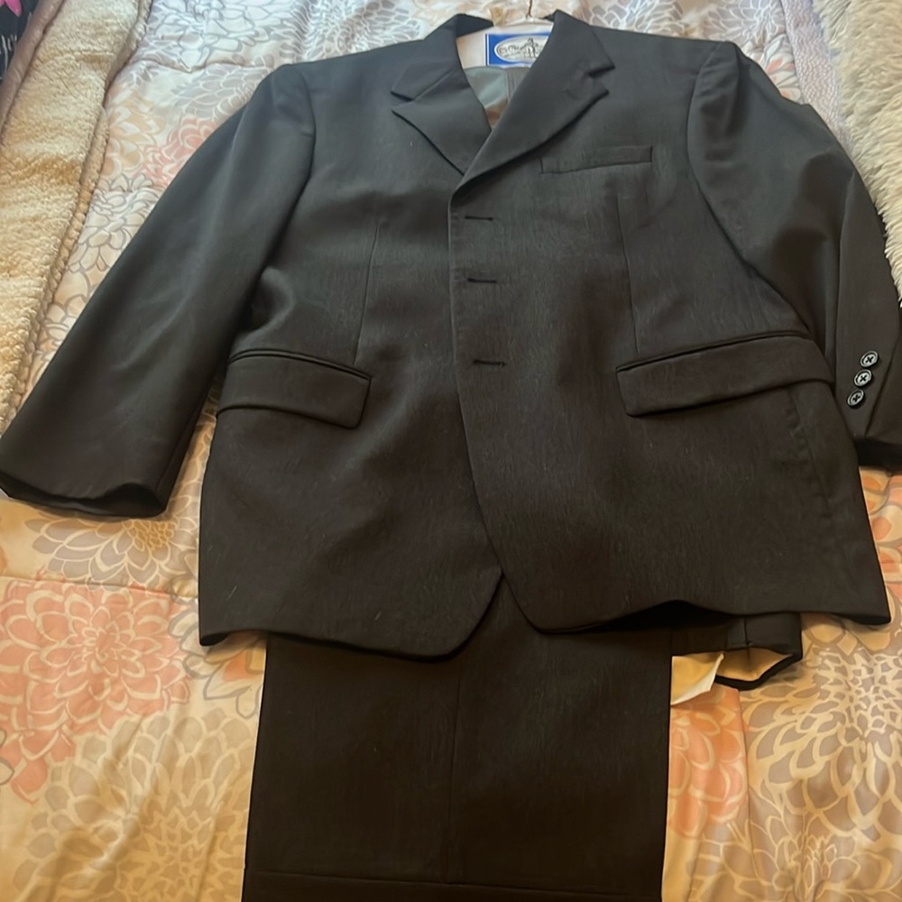 Men’s suit. Freshly dry cleaned.